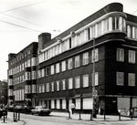 De Toministraat met de blokken van Wijdeveld (al klaar voor de sloop) en Kruyswijk.
<br/>
Martin Alberts, Beeldbank Stadsarchief, juli 1991